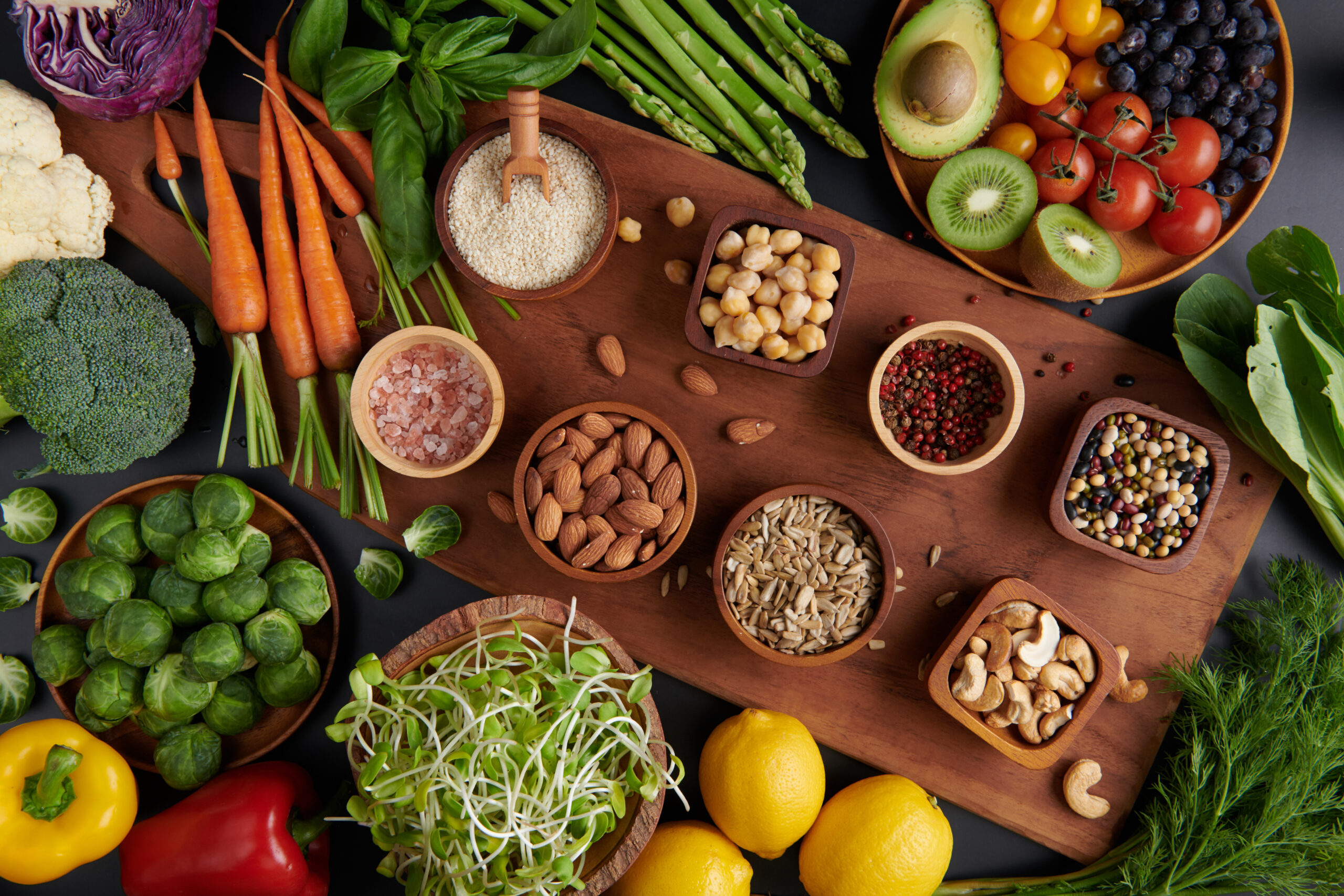 Different vegetables, seeds and fruits on table. Healthy diet. v Different vegetables, seeds and fruits on table. Healthy diet. v