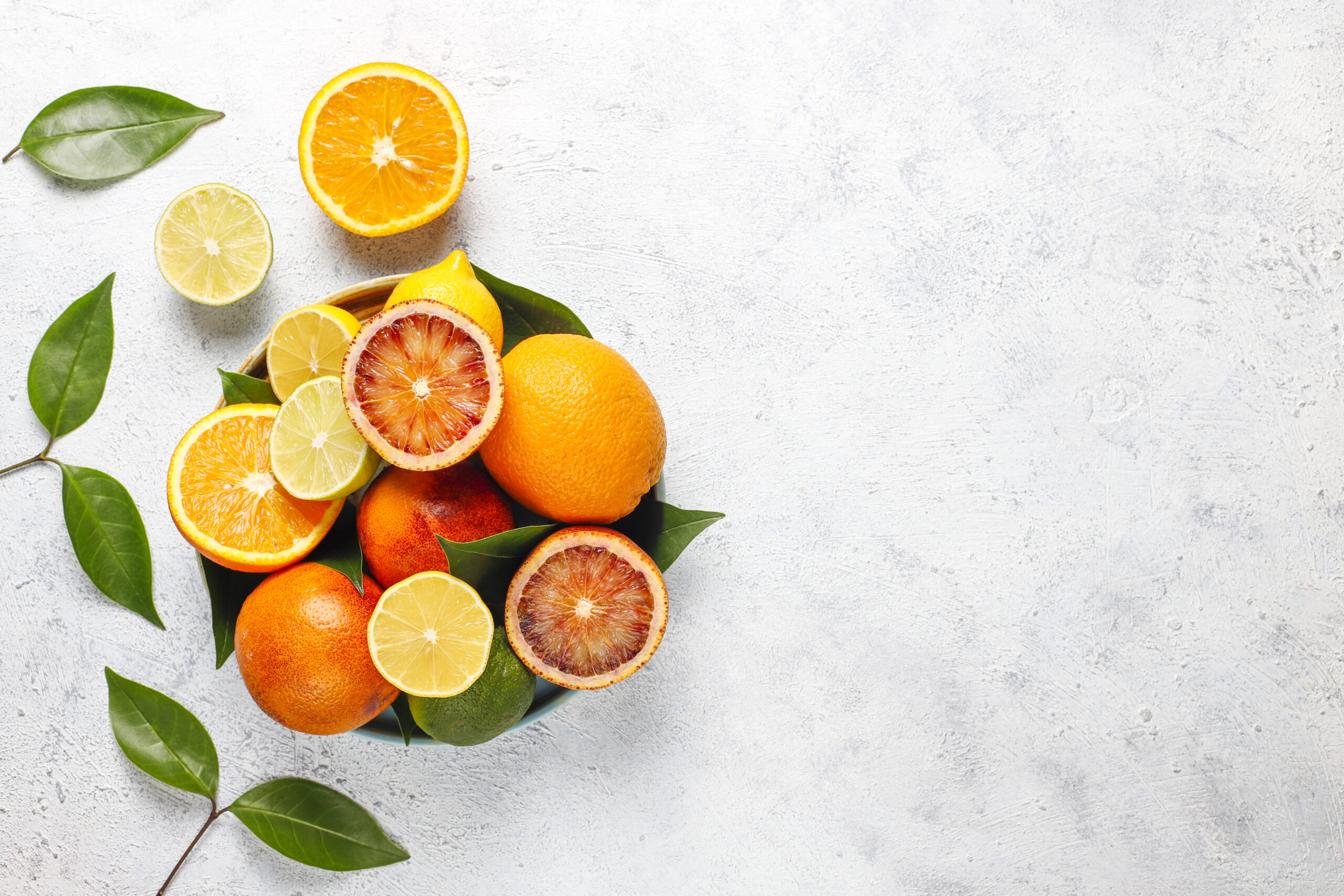 Citrus background with assorted fresh-citrus fruits,lemon,orange Citrus background with assorted fresh-citrus fruits,lemon,orange