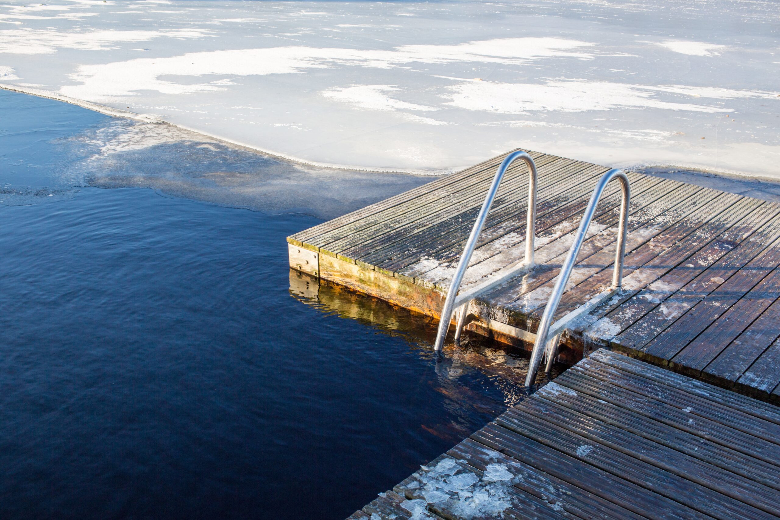 Landscape shot of a natural ice pool in Sweden Landscape shot of a natural ice pool in Sweden