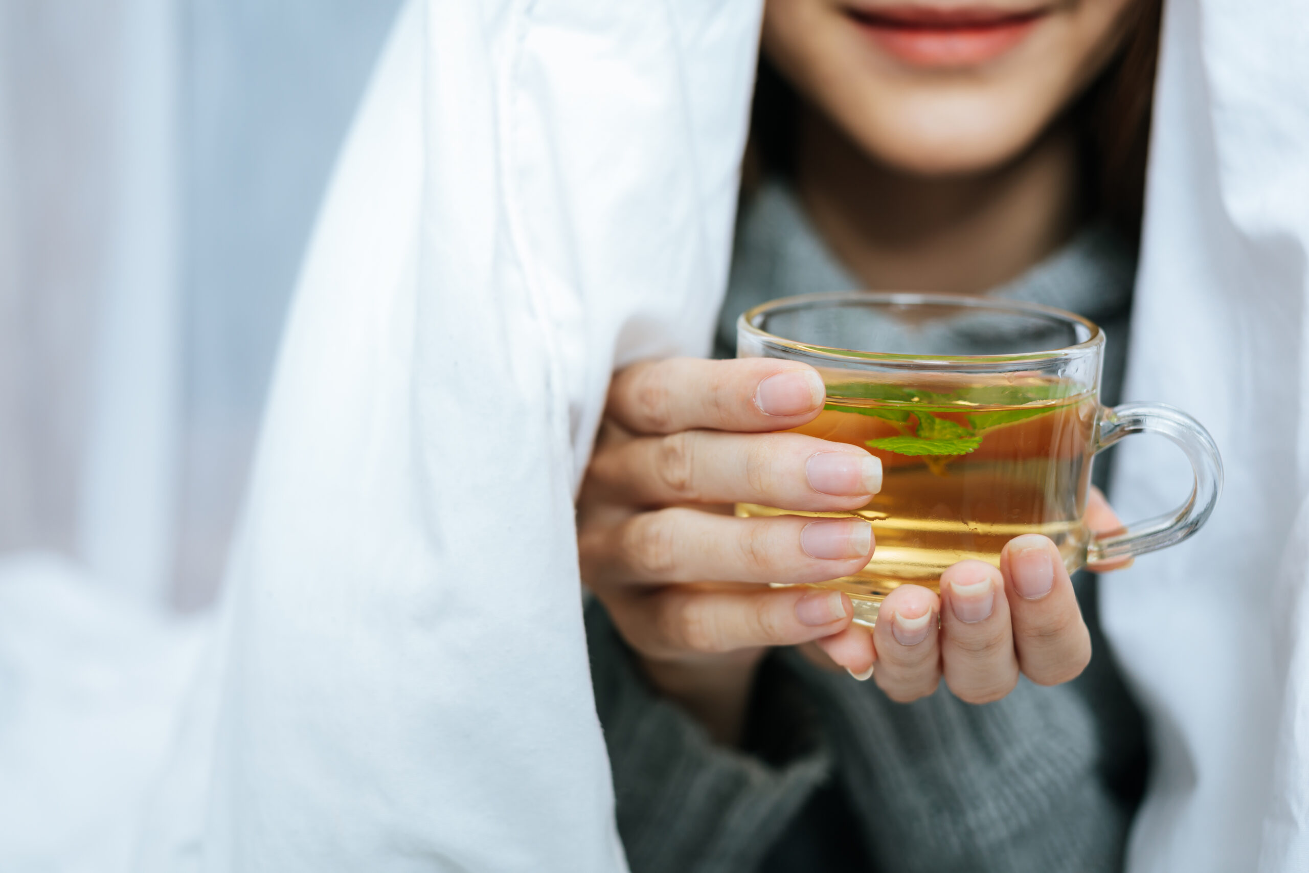 Sipping herbal tea on a cold day Sipping herbal tea on a cold day