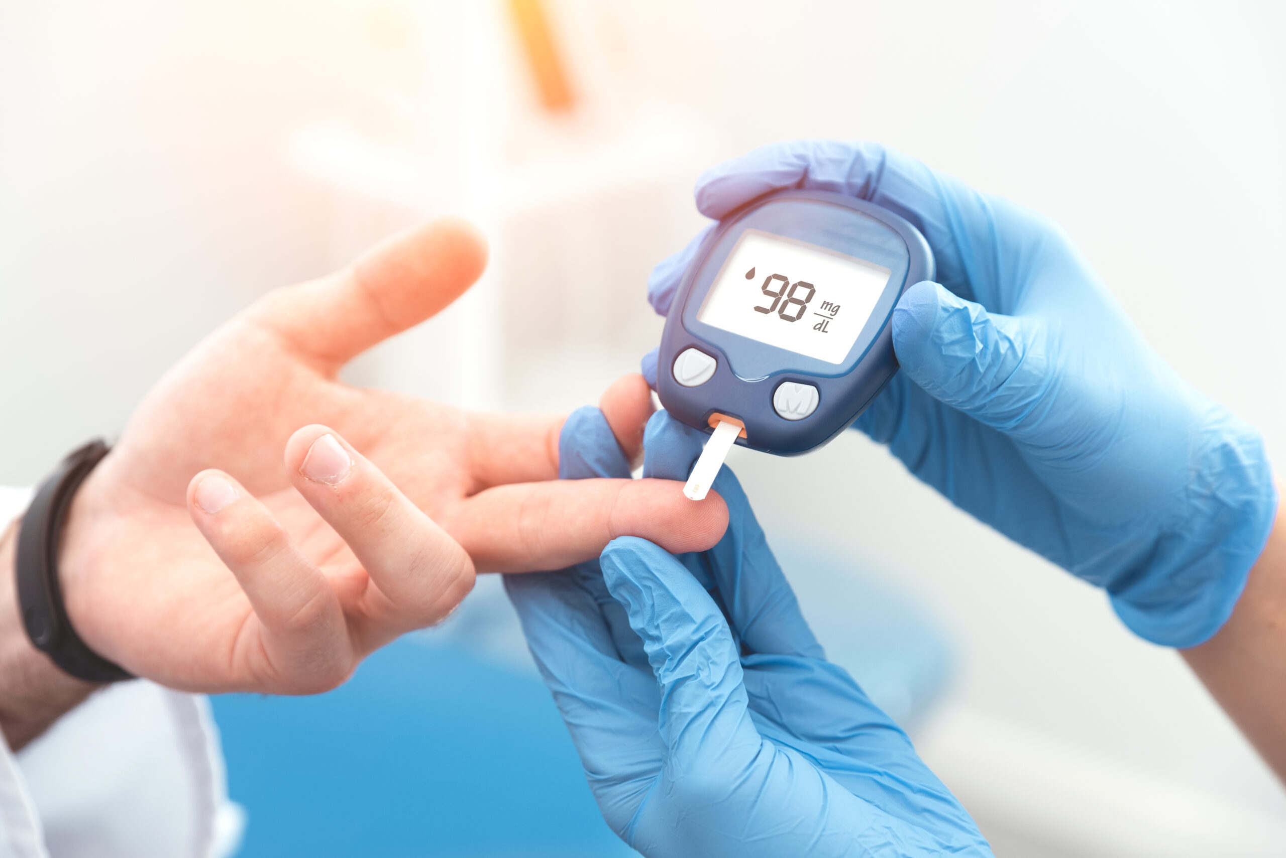 Doctor,Checking,Blood,Sugar,Level,With,Glucometer.,Treatment,Of,Diabetes Doctor,Checking,Blood,Sugar,Level,With,Glucometer.,Treatment,Of,Diabetes