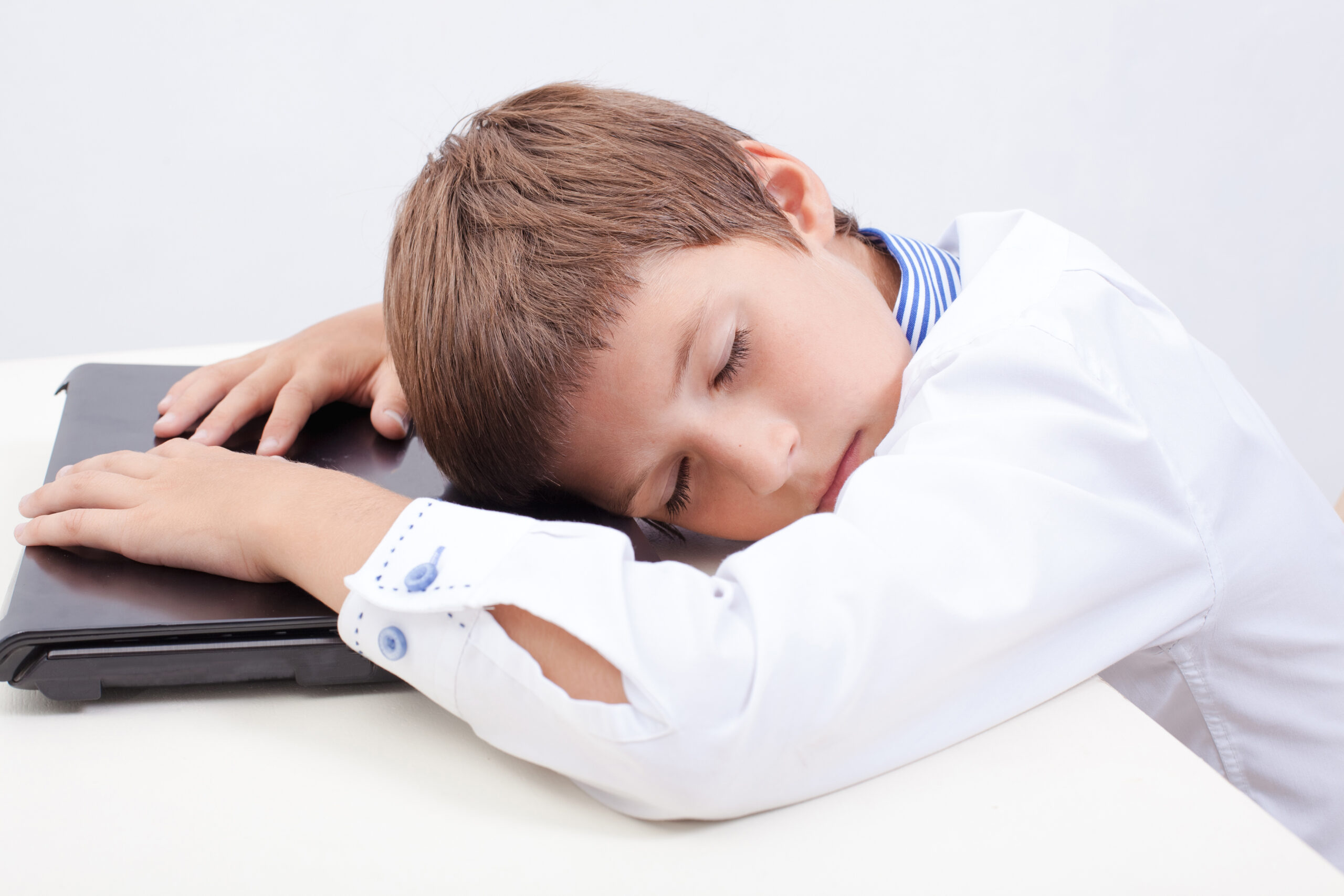 Boy using his laptop computer Boy using his laptop computer