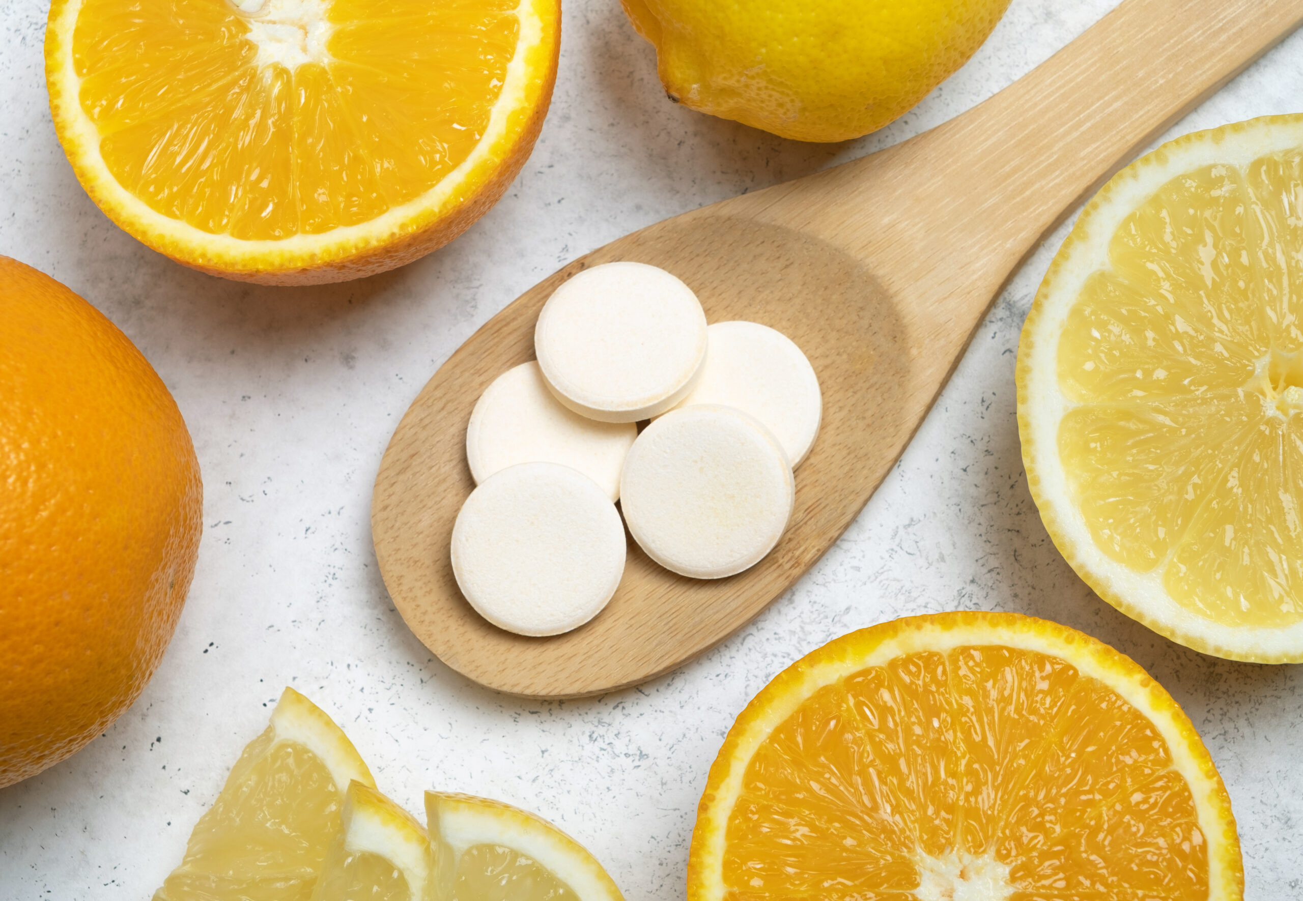 Fresh,Citrus,Fruits,And,Wooden,Spoon,With,Pills,Vitamin,C Fresh,Citrus,Fruits,And,Wooden,Spoon,With,Pills,Vitamin,C