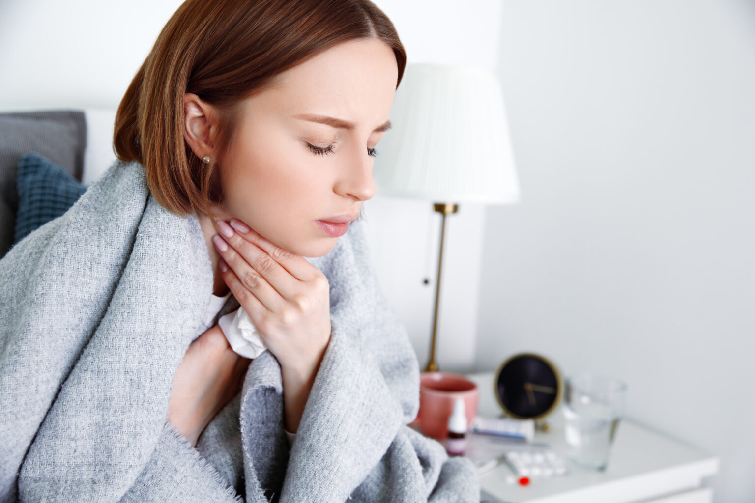 Sick,Woman,Covered,In,Blanket,At,Home,In,Isolation,At Sick,Woman,Covered,In,Blanket,At,Home,In,Isolation,At