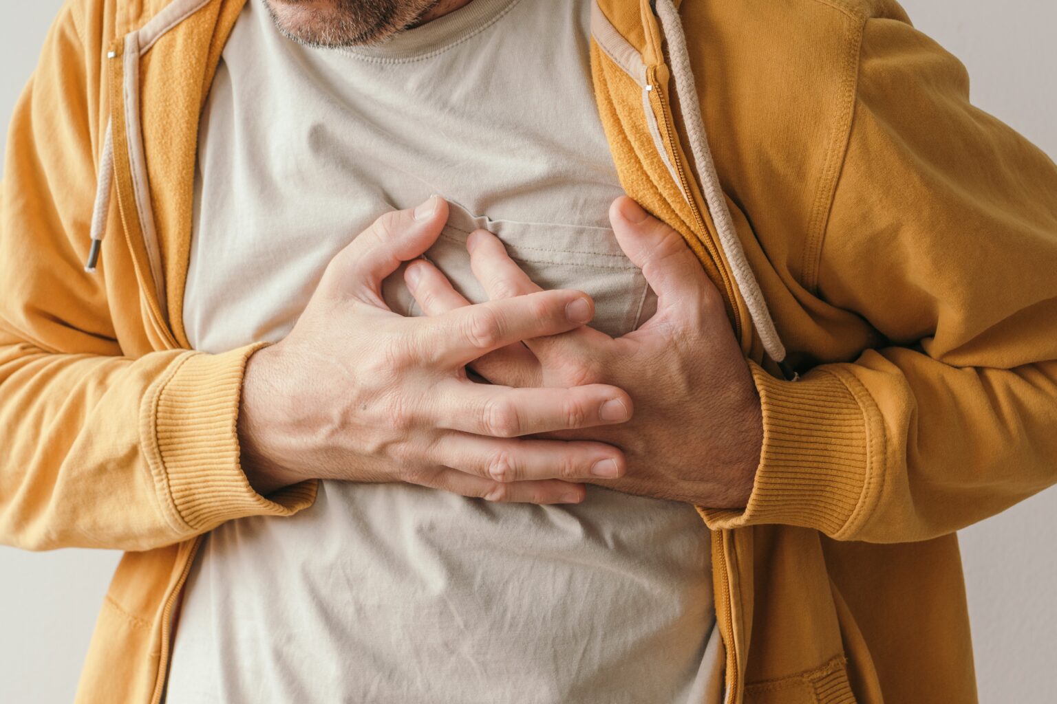 Aching,Heart,And,Heart,Attack,,Adult,Male,With,Painful,Grimace Aching,Heart,And,Heart,Attack,,Adult,Male,With,Painful,Grimace