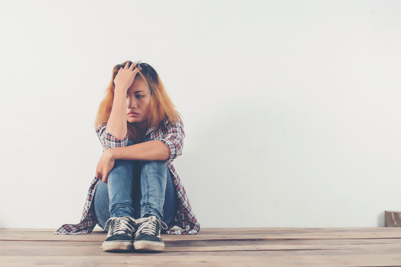 Sad woman hug her knee,nobody Sad woman hug her knee,nobody