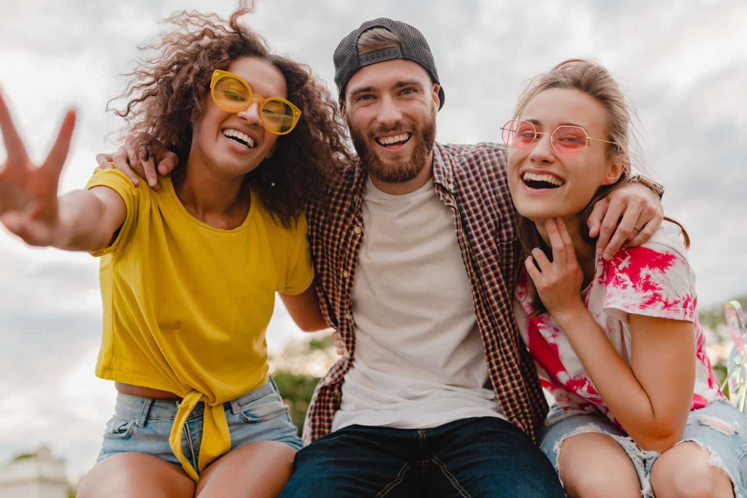 happy young company of smiling friends excited in park, man and women having fun together, colorful summer hipster fashion style, smiling happy young company of smiling friends excited in park, man and women having fun together, colorful summer hipster fashion style, smiling