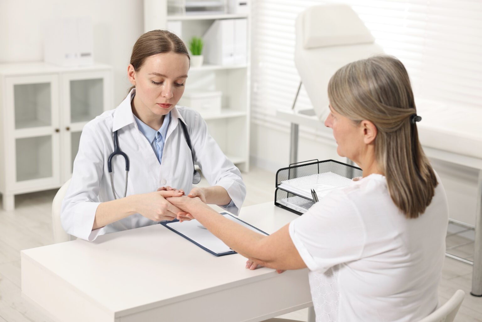 Arthritis,Symptoms.,Doctor,Examining,Patient’s,Wrist,In,Hospital Arthritis,Symptoms.,Doctor,Examining,Patient’s,Wrist,In,Hospital