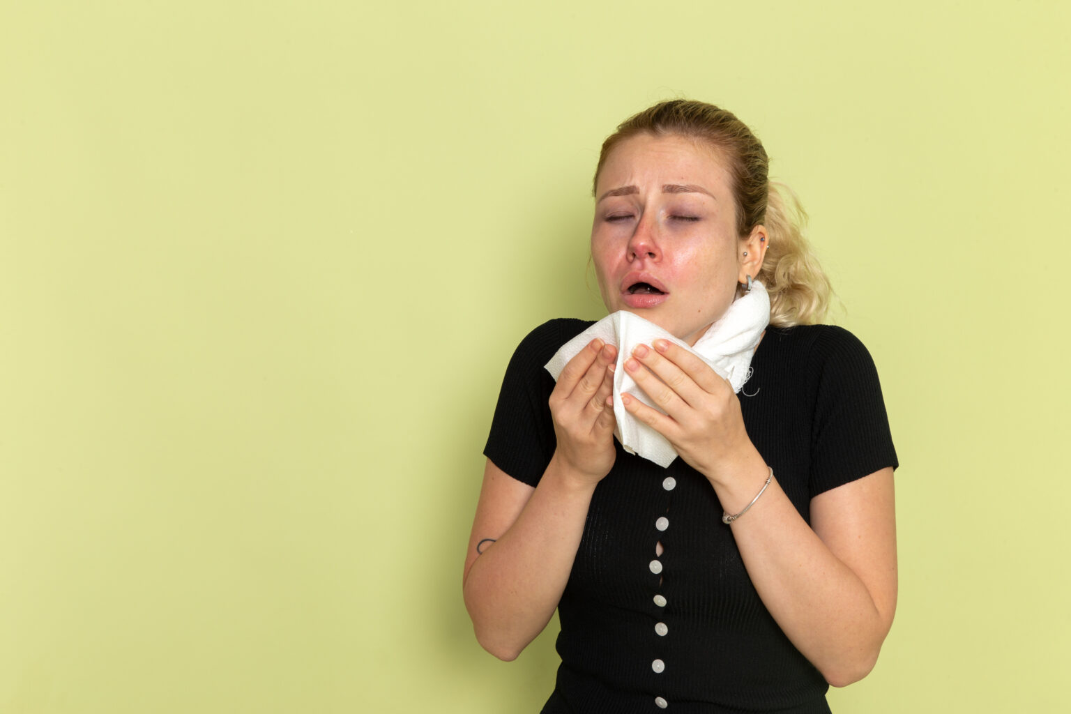 front-view-young-female-black-shirt-white-towel-around-her-throat-feeling-very-sick-ill-sneezing-green-wall-illness-sickness-female-color-health
