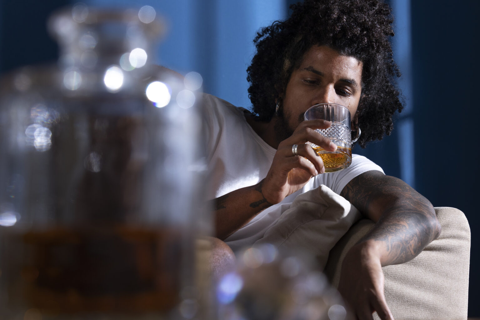 front-view-depressed-man-drinking