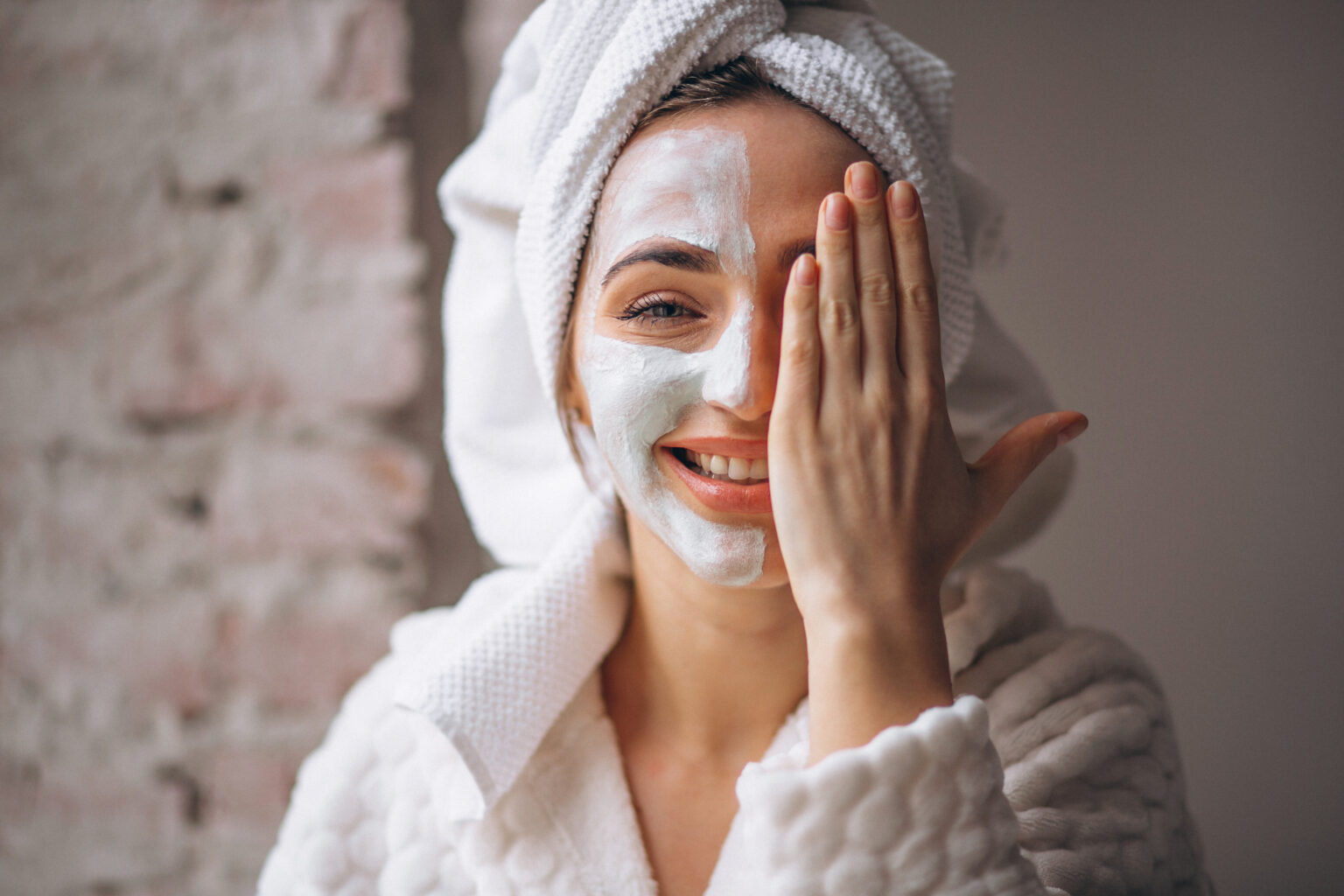 Portrait of a woman with a facial mask half face Portrait of a woman with a facial mask half face