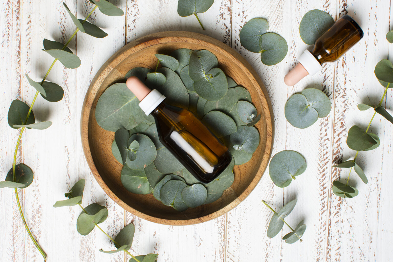 flat-lay-bowl-with-leaves-oil flat-lay-bowl-with-leaves-oil