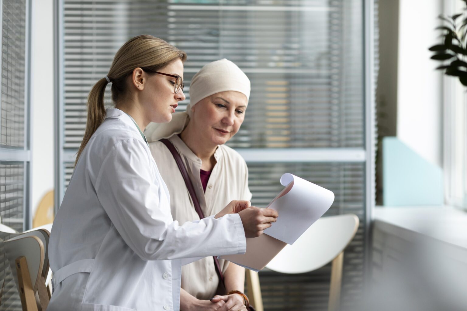middle-aged-woman-with-skin-cancer-talking-with-her-doctor