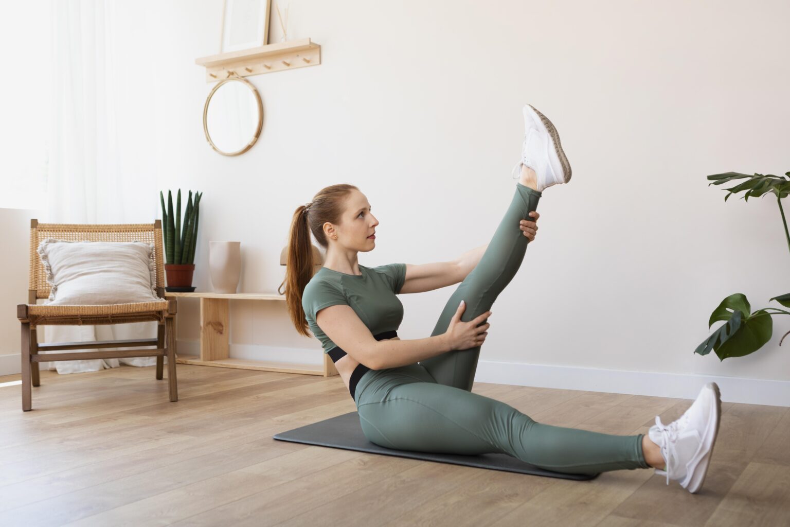 full-shot-woman-stretching-leg full-shot-woman-stretching-leg
